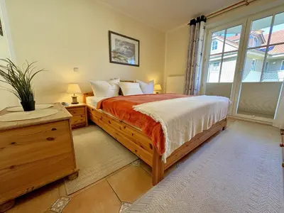 Ein Bett oder Betten in einem Zimmer der Unterkunft Birkenhof App 66