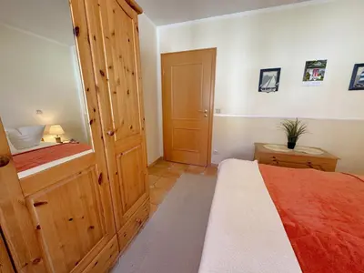 Ein Bett oder Betten in einem Zimmer der Unterkunft Birkenhof App 66