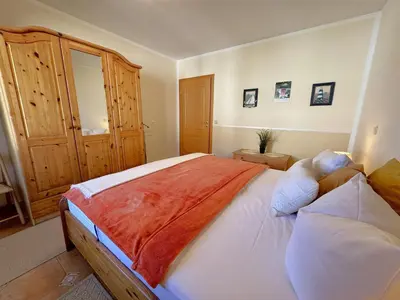 Ein Bett oder Betten in einem Zimmer der Unterkunft Birkenhof App 66