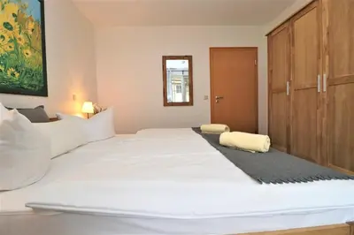 Ein Bett oder Betten in einem Zimmer der Unterkunft Birkenhof App 67