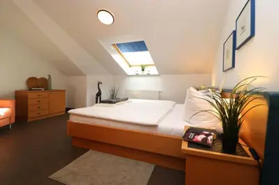 Ein Bett oder Betten in einem Zimmer der Unterkunft Birkenhof App 72