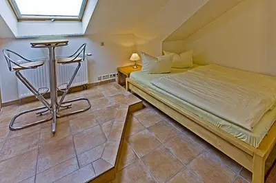 Ein Bett oder Betten in einem Zimmer der Unterkunft Birkenhof App 73