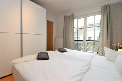 Ein Bett oder Betten in einem Zimmer der Unterkunft Birkenhof App 74
