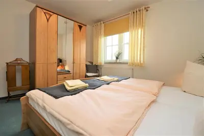 Ein Bett oder Betten in einem Zimmer der Unterkunft Birkenhof App 75