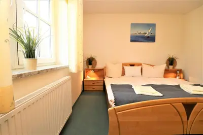 Ein Bett oder Betten in einem Zimmer der Unterkunft Birkenhof App 75