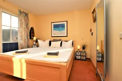 Ein Bett oder Betten in einem Zimmer der Unterkunft Birkenhof App 76