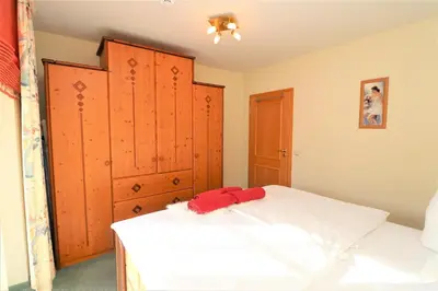 Ein Bett oder Betten in einem Zimmer der Unterkunft Birkenhof App 77