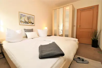 Ein Bett oder Betten in einem Zimmer der Unterkunft Birkenhof App 77