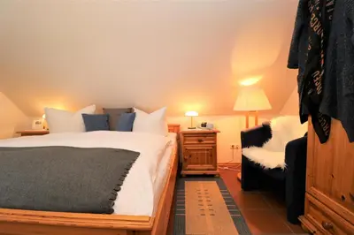 Ein Bett oder Betten in einem Zimmer der Unterkunft Haus Clarissa, App 02