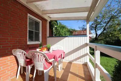 Ein Balkon oder eine Terrasse in der Unterkunft Ferienhäuser Doppelhaushälfte, Grüner Weg
