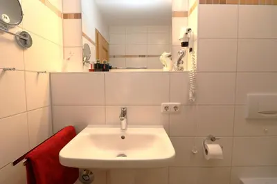 Ein Badezimmer in der Unterkunft Oewern Diek App 02