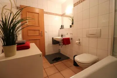 Ein Badezimmer in der Unterkunft Oewern Diek App 06