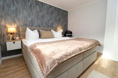 Ein Bett oder Betten in einem Zimmer der Unterkunft Oewern Diek App 10