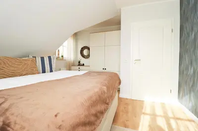 Ein Bett oder Betten in einem Zimmer der Unterkunft Oewern Diek App 12