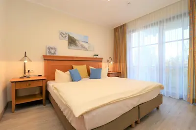 Ein Bett oder Betten in einem Zimmer der Unterkunft Oewern Diek App 24