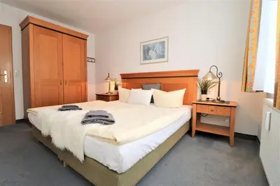 Ein Bett oder Betten in einem Zimmer der Unterkunft Oewern Diek App 27