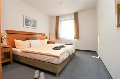 Ein Bett oder Betten in einem Zimmer der Unterkunft Oewern Diek App 27