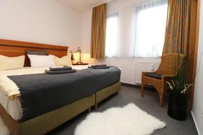 Ein Bett oder Betten in einem Zimmer der Unterkunft Oewern Diek App 28