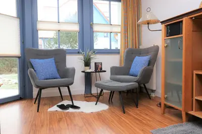 Ein Sitzbereich in der Unterkunft Oewern Diek App 28