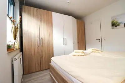 Ein Bett oder Betten in einem Zimmer der Unterkunft Oewern Diek App 29