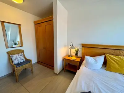 Ein Bett oder Betten in einem Zimmer der Unterkunft Oewern Diek App 30