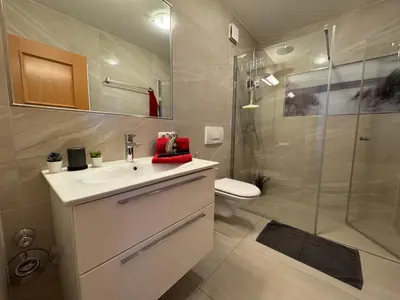 Ein Badezimmer in der Unterkunft Oewern Diek App 30