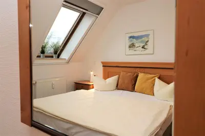 Ein Bett oder Betten in einem Zimmer der Unterkunft Oewern Diek App 33