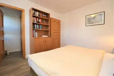Ein Bett oder Betten in einem Zimmer der Unterkunft Oewern Diek App 34