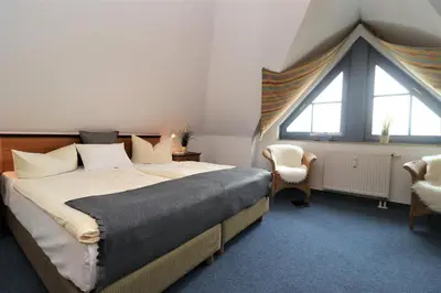 Ein Bett oder Betten in einem Zimmer der Unterkunft Oewern Diek App 35
