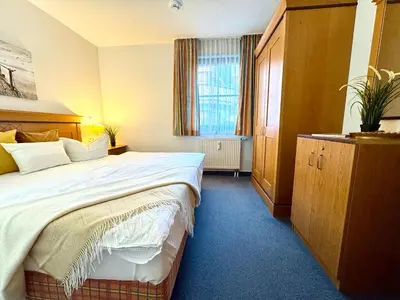 Ein Bett oder Betten in einem Zimmer der Unterkunft Oewern Diek App 38