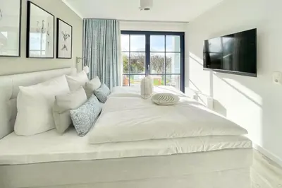 Ein Bett oder Betten in einem Zimmer der Unterkunft Oewern Diek App 39