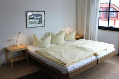 Ein Bett oder Betten in einem Zimmer der Unterkunft Oewern Diek App 43