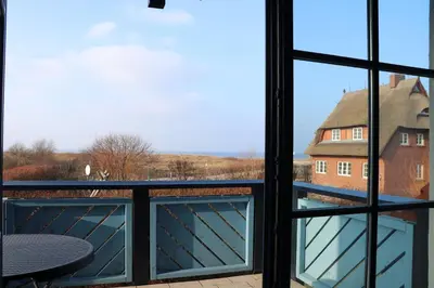 Ein Balkon oder eine Terrasse in der Unterkunft Oewern Diek App 43