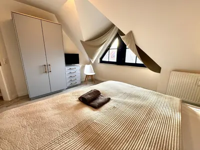 Ein Bett oder Betten in einem Zimmer der Unterkunft Oewern Diek App 47
