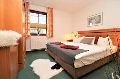 Ein Bett oder Betten in einem Zimmer der Unterkunft Oewern Diek App 51
