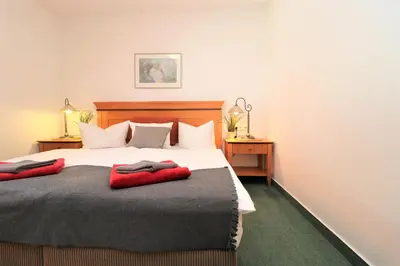 Ein Bett oder Betten in einem Zimmer der Unterkunft Oewern Diek App 51