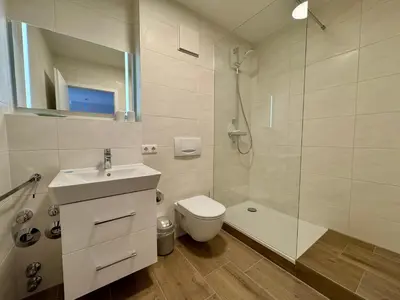 Ein Badezimmer in der Unterkunft Oewern Diek App 52