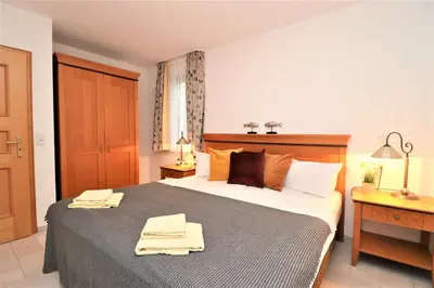 Ein Bett oder Betten in einem Zimmer der Unterkunft Oewern Diek App 53