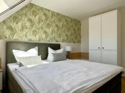 Ein Bett oder Betten in einem Zimmer der Unterkunft Oewern Diek App 57