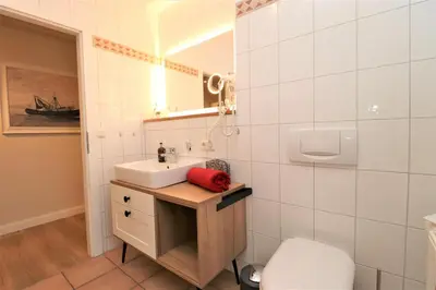Ein Badezimmer in der Unterkunft Oewern Diek App 58