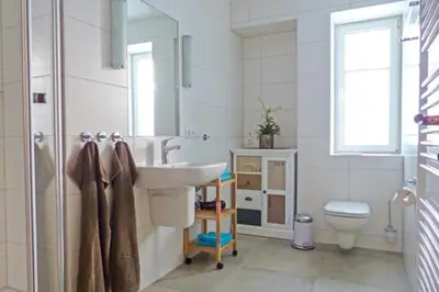 Ein Badezimmer in der Unterkunft Wohnpark Strandstraße App 05 Ostseesuite
