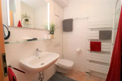 Ein Badezimmer in der Unterkunft Wohnpark Strandstraße App 06