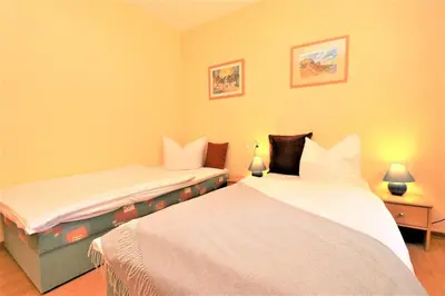Ein Bett oder Betten in einem Zimmer der Unterkunft Wohnpark Strandstraße App 11