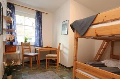 Ein Bett oder Betten in einem Zimmer der Unterkunft Wohnpark Strandstraße App 13