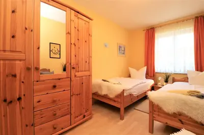 Ein Bett oder Betten in einem Zimmer der Unterkunft Wohnpark Schmiedestraße App 15